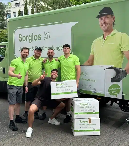 Das Sorglos-Team posiert mit Stefano Zarella vor dem Sorglos-Mobil