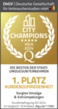 Goldene Auszeichnung mit Lorbeerkranz und Schriftzug 'CITY CHAMPIONS 2024 1. PLATZ'